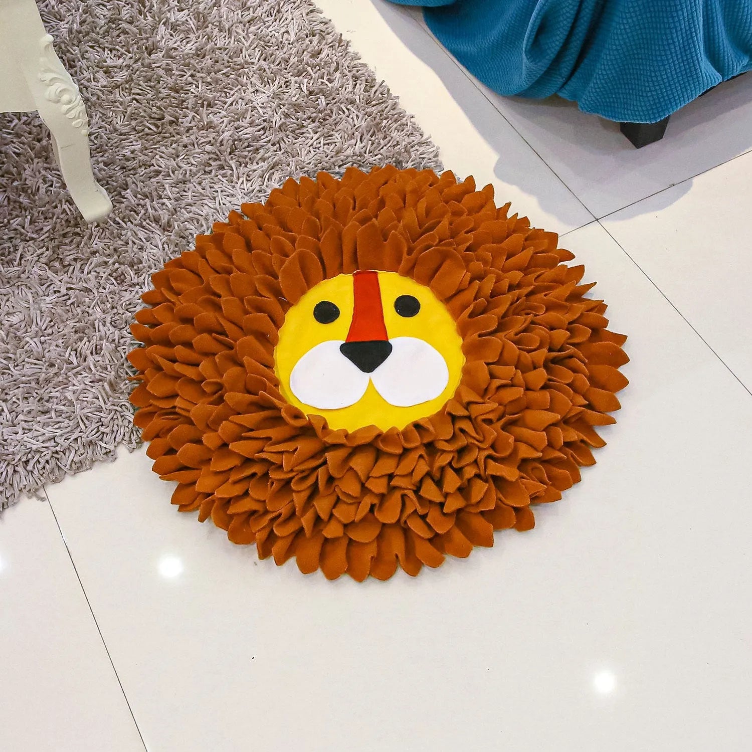 Brown pet snuffle mat with fabric folds for hiding treats, measuring 33cm by 25cm