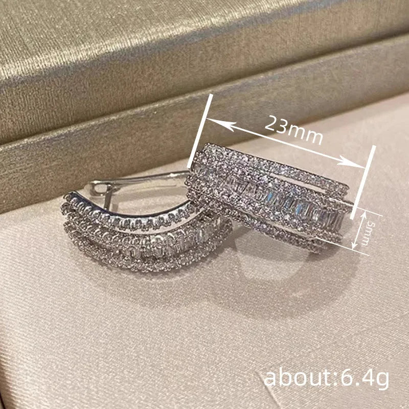 Geometric zircon stud earrings in white gold colour plating for women casual wear