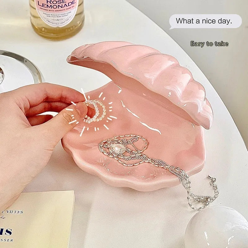 Yellow porcelain storage tray with optional night light, shown in pink and white shell options.