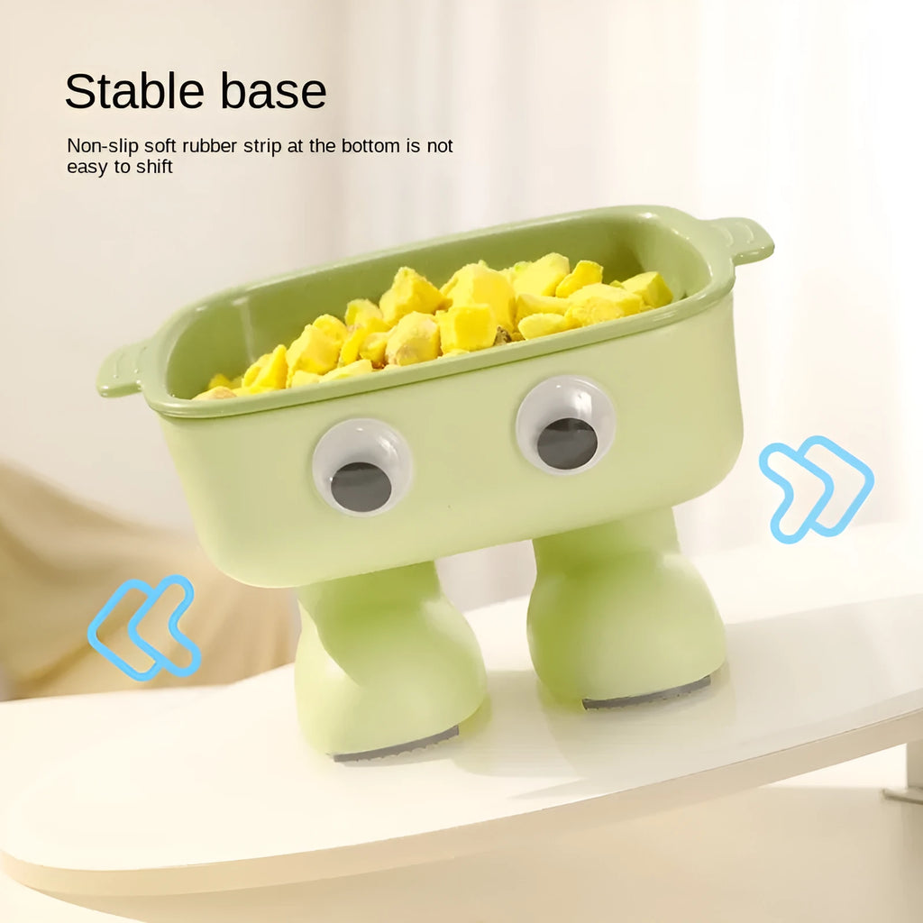 Green robot-shaped elevated cat bowl with tilted dish and non-slip base