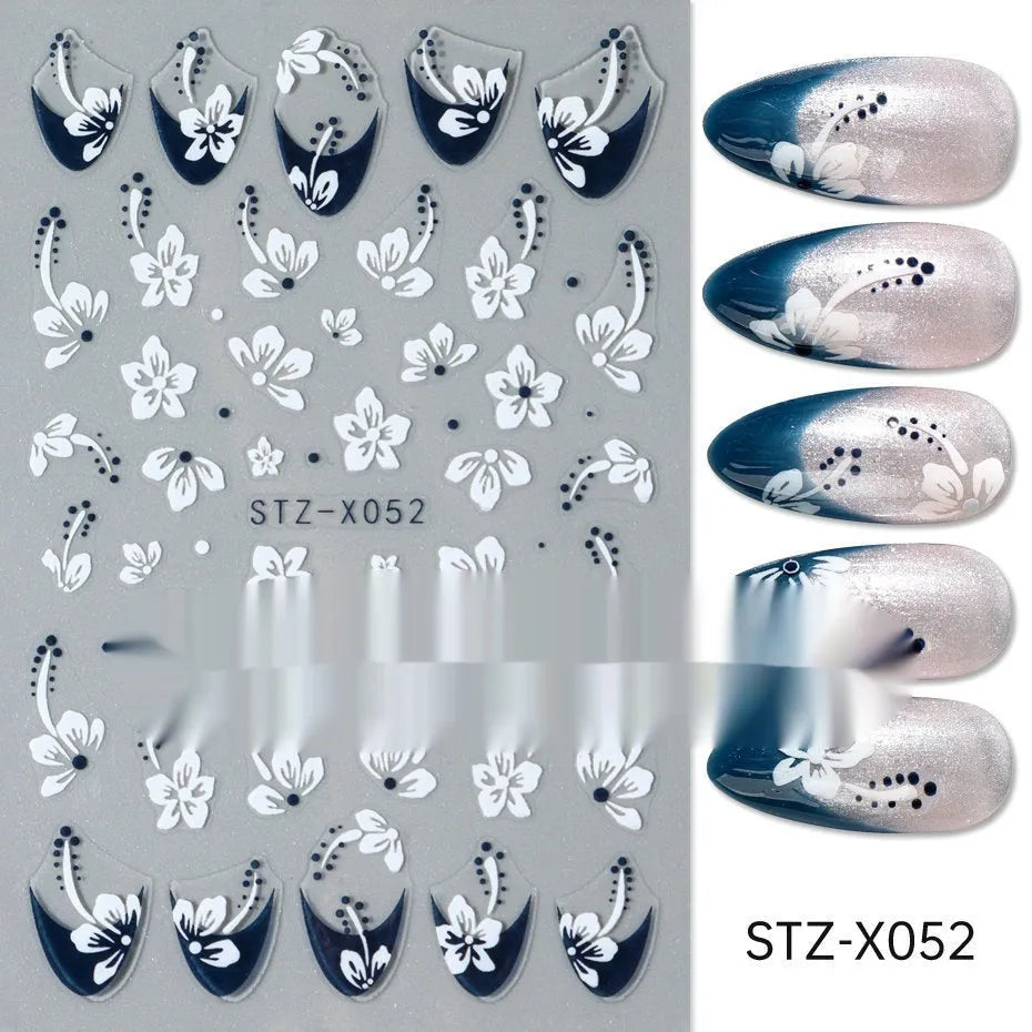 Sheet of black and silver stripe nail art stickers from a cartoon series for DIY manicures.