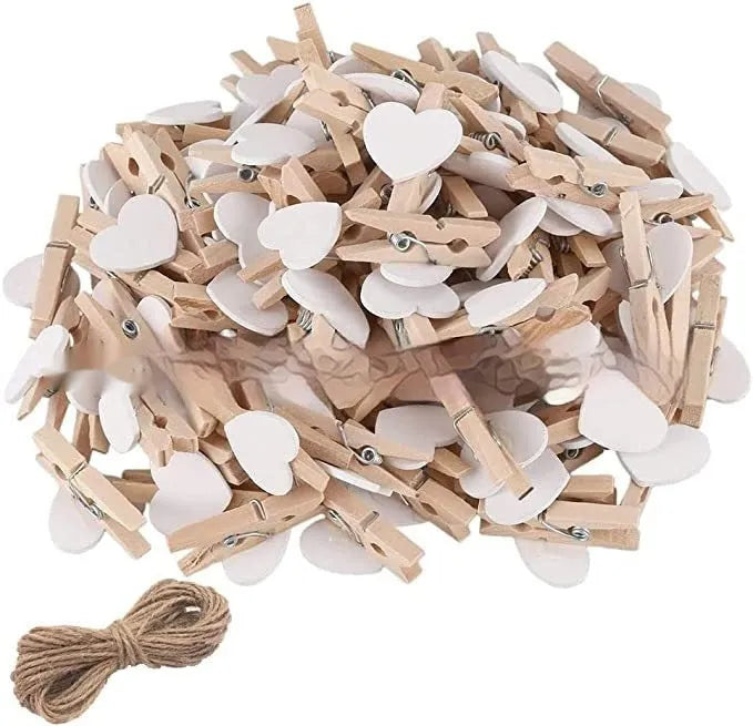 Handmade solid wood heart-shaped clips in red, rose red, and white colours measuring 3cm