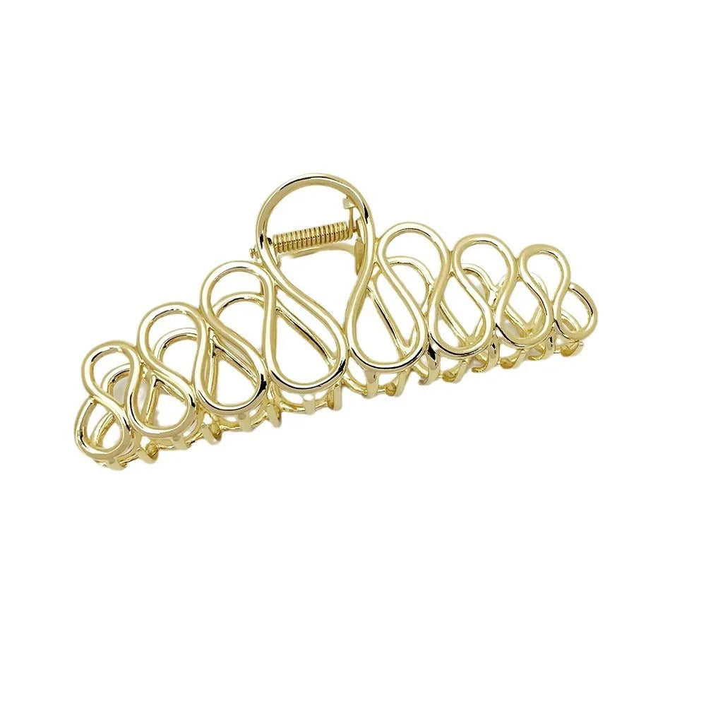 Large gold or silver alloy hair clip with minimalist design and European tassel detailing for women's updo hairstyles