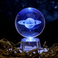 White crystal ball ornament with inner carving on fixed base for tabletop display
