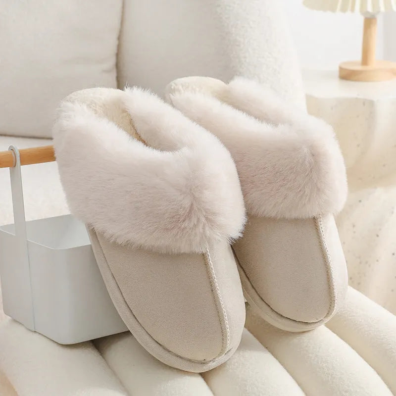 Brown women's plush indoor slippers with round toe, stitching detail, and flat non-slip sole.