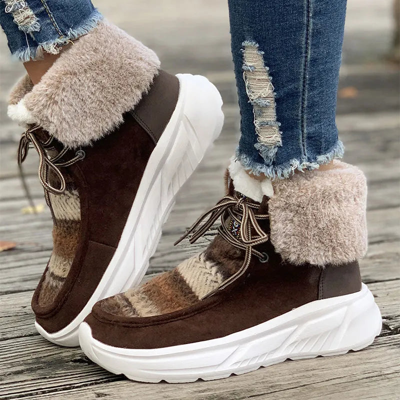 Women's beige lace-up suede snow boots with thermal lining and a thick rubber sole.