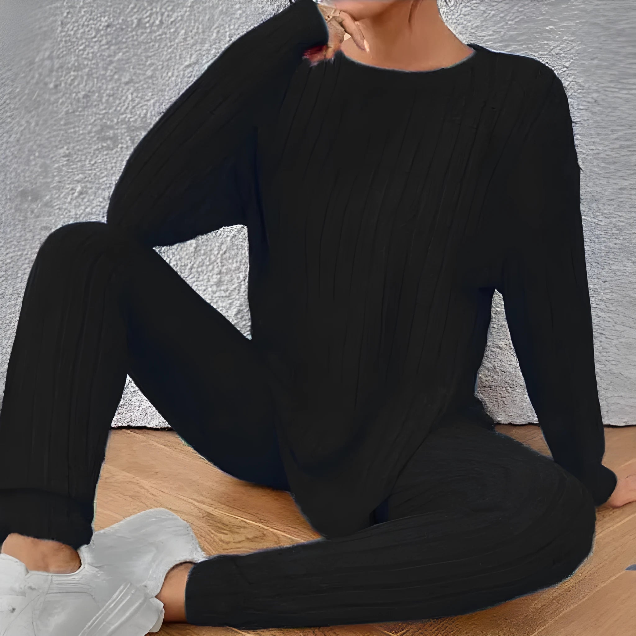 Women's black sunken stripe two-piece homewear set with matching trousers and top