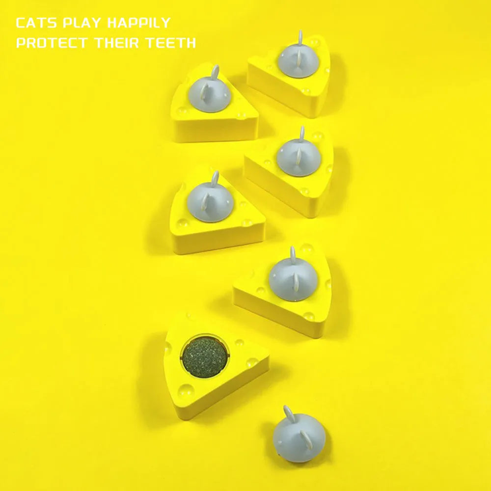 Five yellow catnip and silvervine chew toy balls for cats on a white background.
