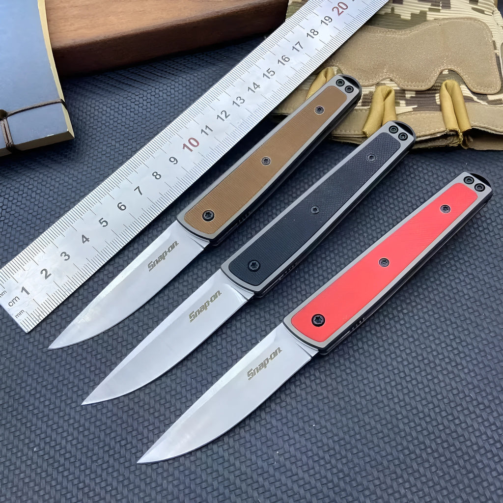 Folding fruit knife with stainless steel blade extended, showing black handle variant with blade measurements