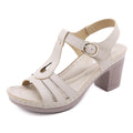 European style women's sandals with thick high heel and metal buckle stitching in patent leather