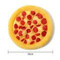 Yellow pizza-shaped squeaky dog toy for teeth grinding and chewing