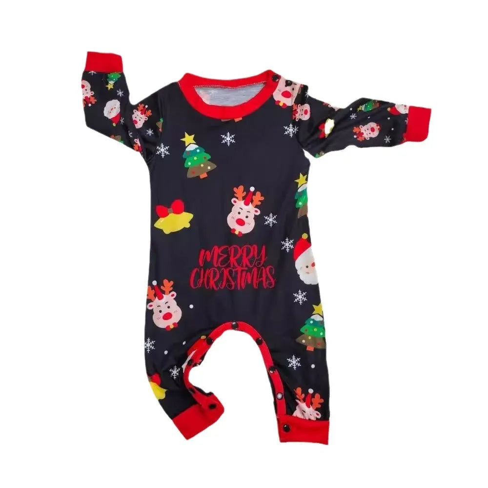 Matching red plaid Christmas pyjamas set for dad, mom, child, baby, and a dog laid out together