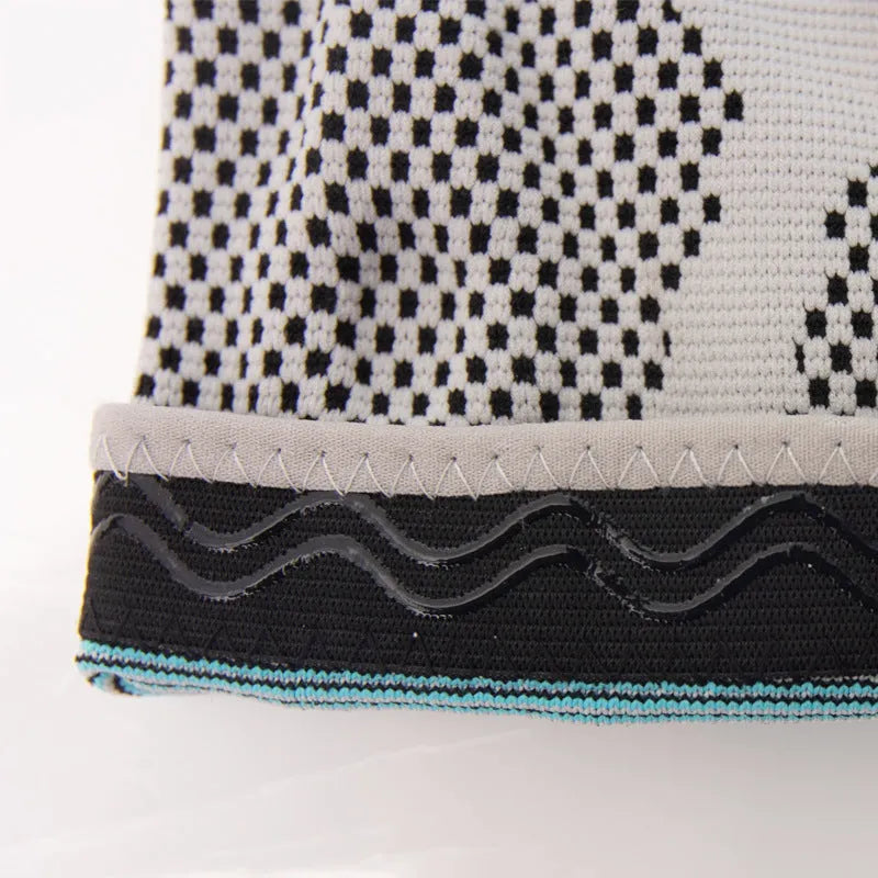 Sky blue elastic fibre knee pads shown in sizes S, M, L, and XL for sports.