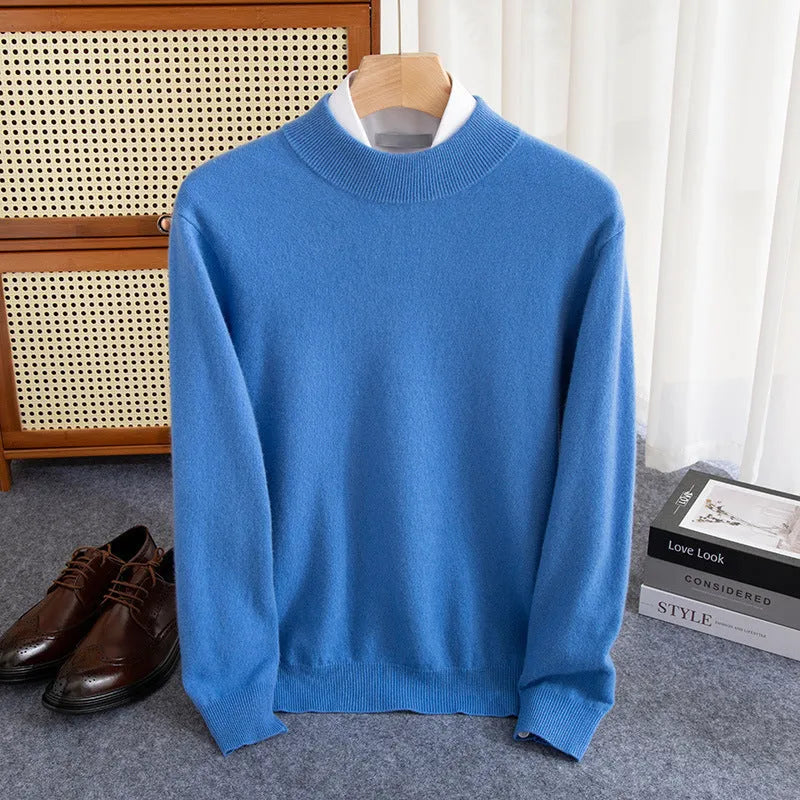 Man wearing a loose-fit half-collar wool sweater in a dark colour, showcasing the knitted texture and neckline design.