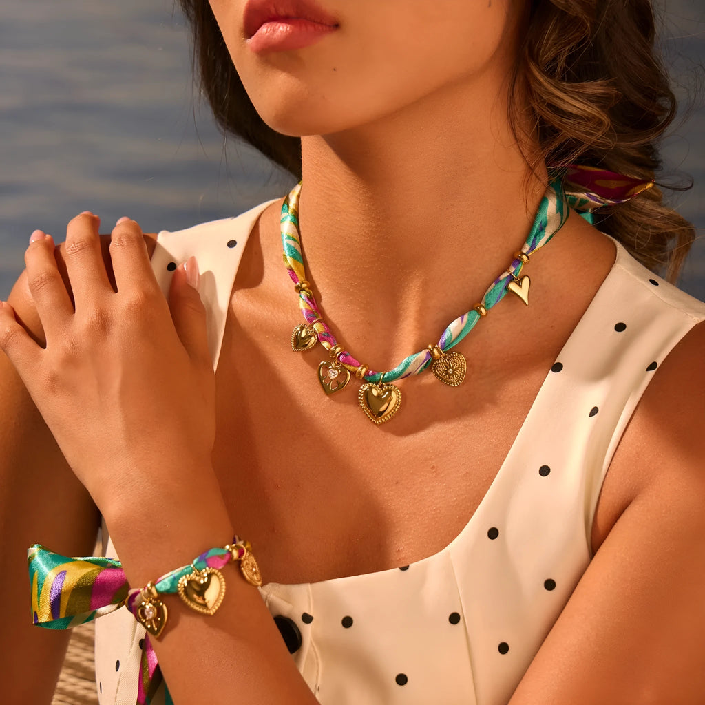 Women's stainless steel necklace with geometric pendant and 18K gold plating
