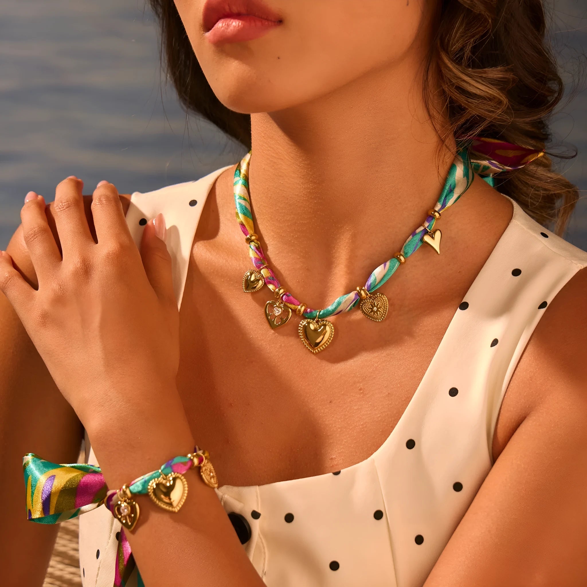 Women's stainless steel necklace with geometric pendant and 18K gold plating