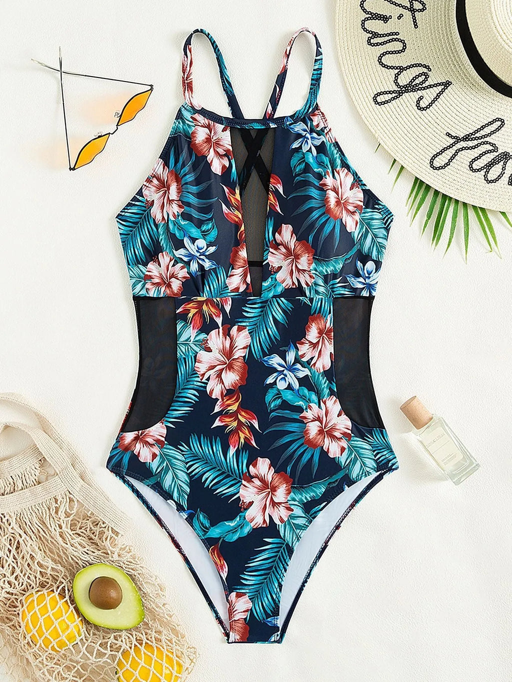 Women's deep V-neck one-piece swimsuit in a solid or gradient colour on a mannequin.