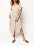 A mid-length casual dress with button detail on the front, shown in a solid colour.
