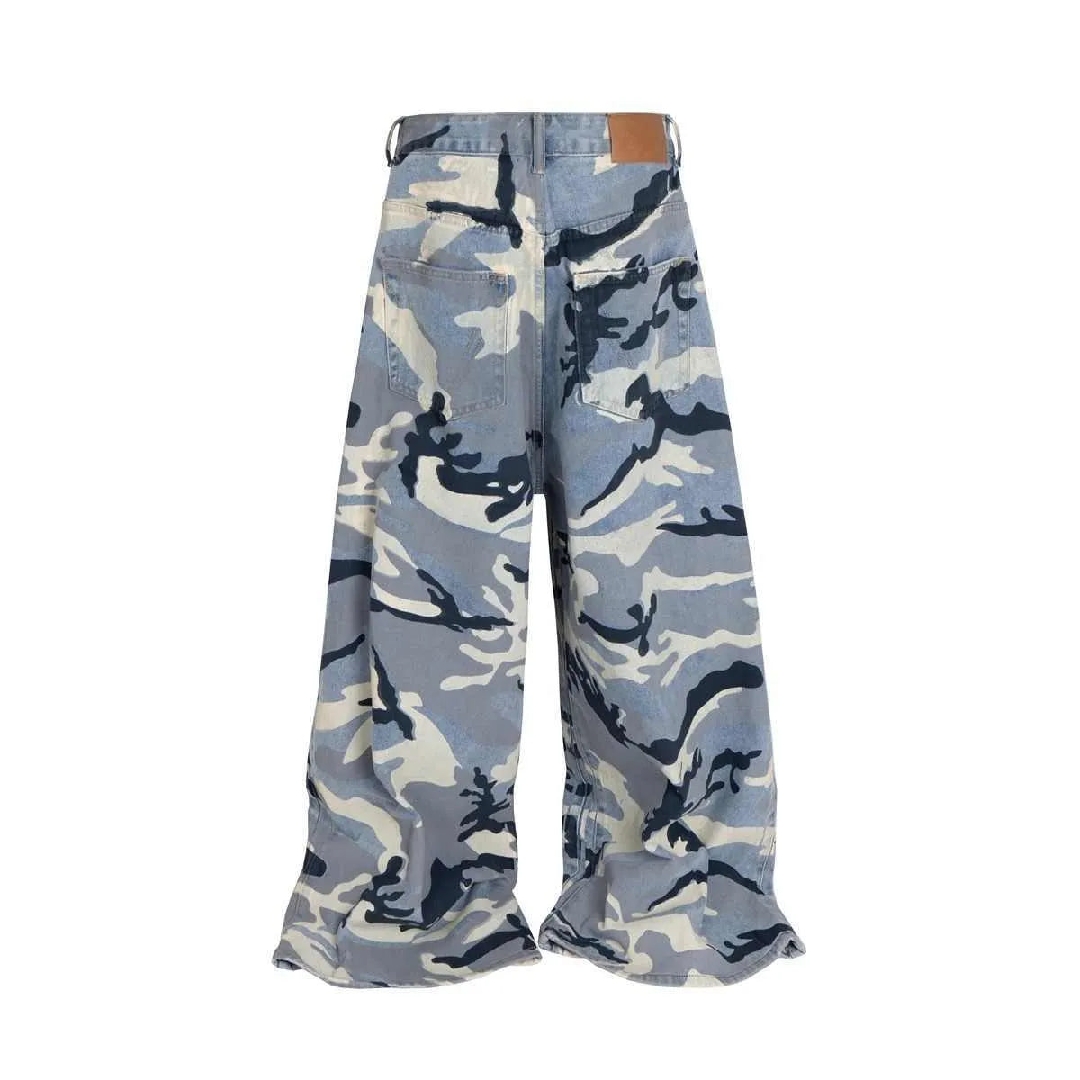 Man and woman modelling loose-fit jeans in a blue snow camouflage pattern with stretch denim fabric.