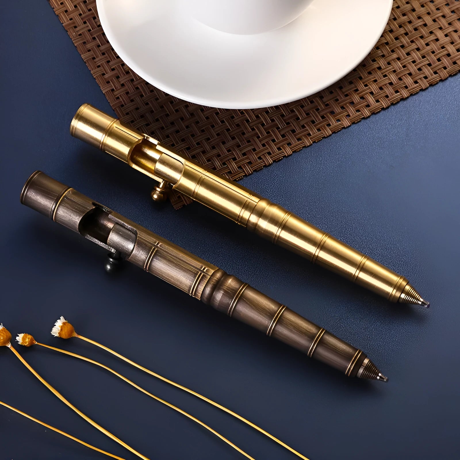 Brass tactical pen with bolt-action mechanism and retro colour finish