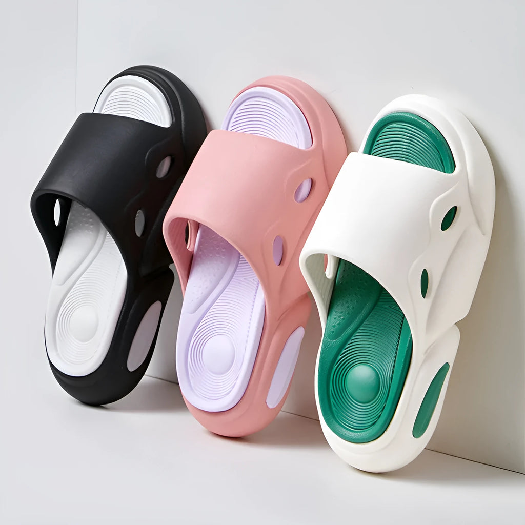 Two-colour EVA slippers for couples with thick sole, shown in pink and purple colour option.