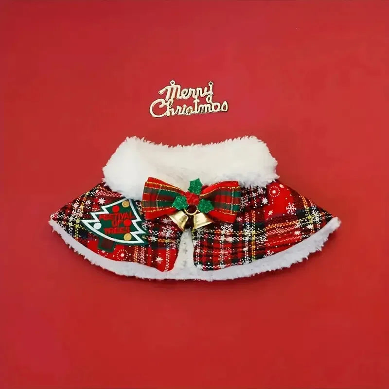 Red holiday pet scarf with bell motif wrapped around dog's neck for Christmas