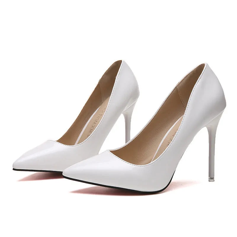 Women's pointed toe stiletto high heel pump in apricot colour with super high heel.