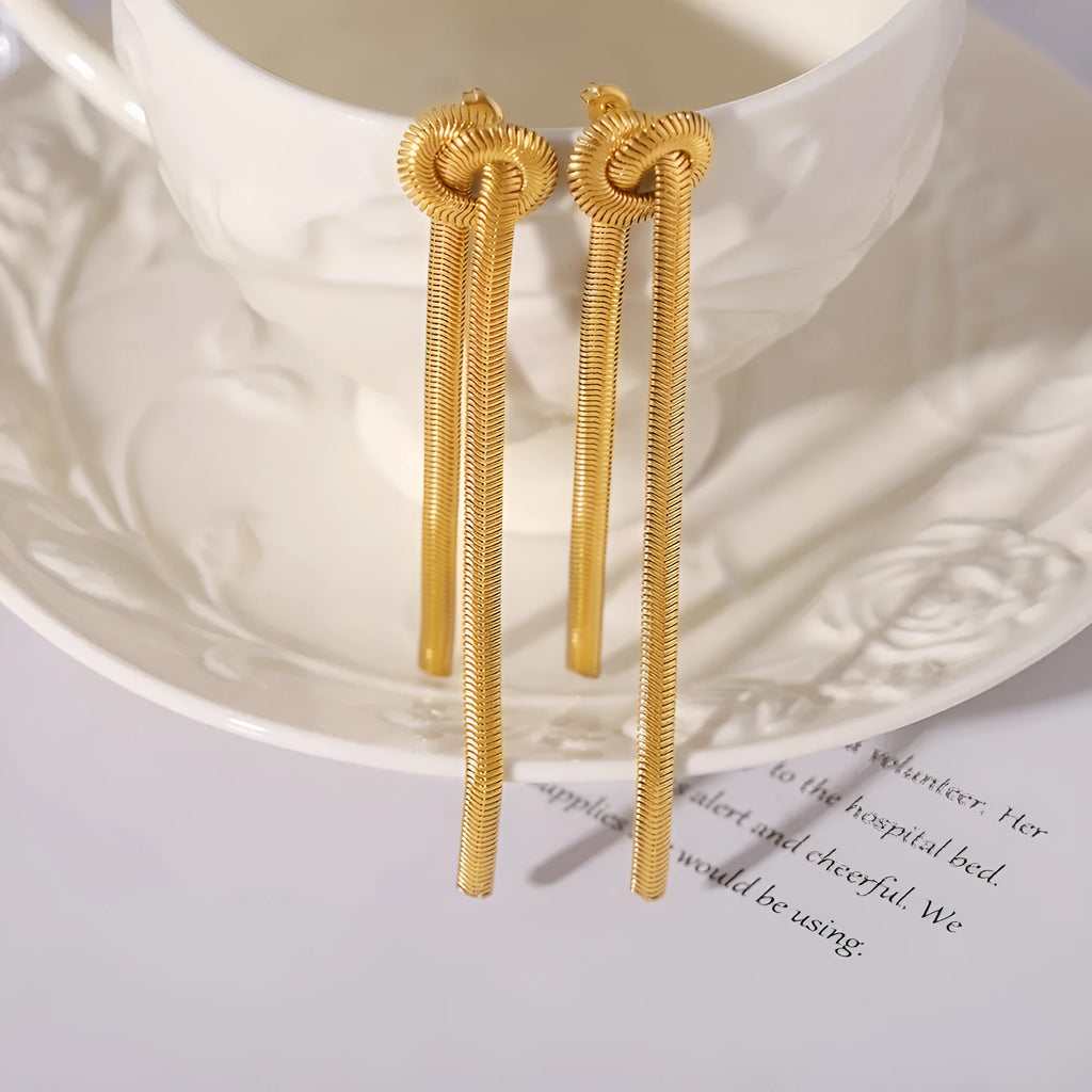 Gold electroplated titanium steel necklace and earrings set with snake chain and knotted tassel design