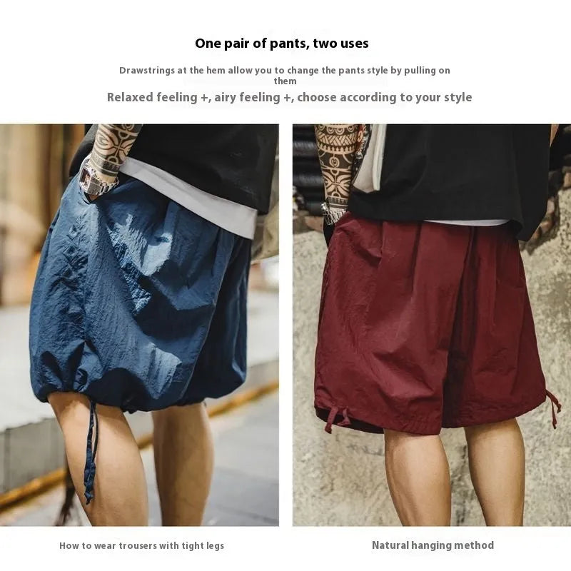 Men's Prussian blue nylon shorts with embroidered design and loose fit