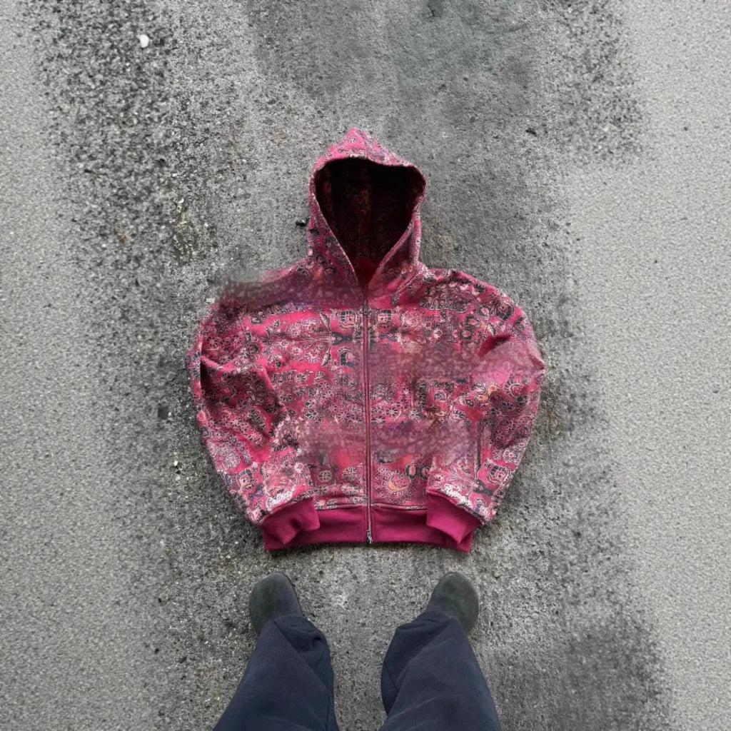 Men's blue hooded loose zip coat with digital printing shown with long sleeves and casual styling
