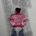 Men's blue hooded loose zip coat with digital printing shown with long sleeves and casual styling