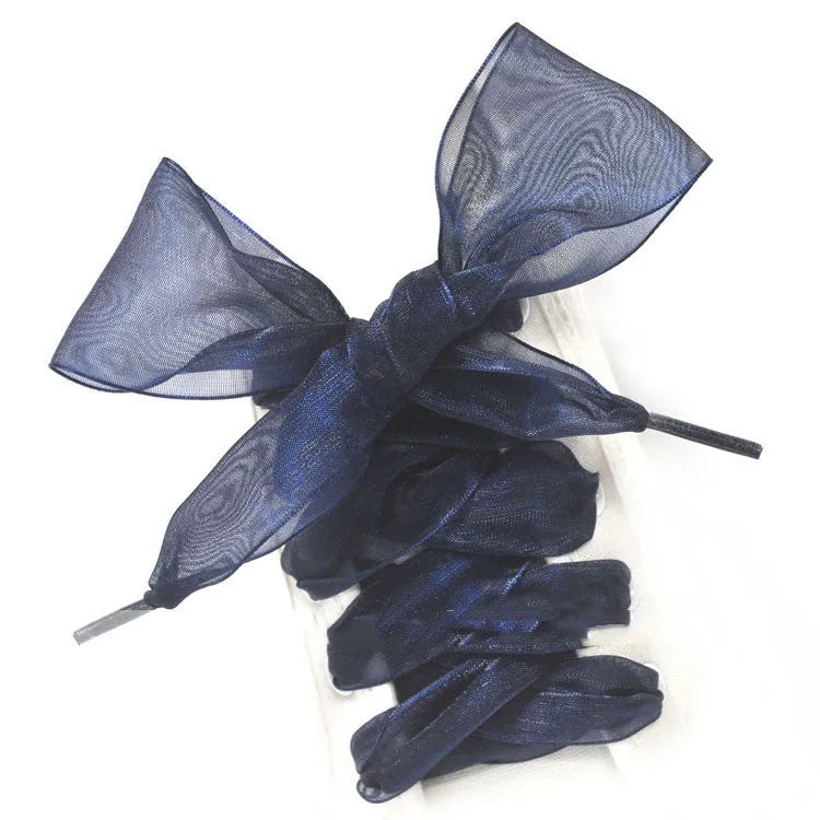 Wide transparent lace shoelaces in multiple solid colours showing 4cm width and length.
