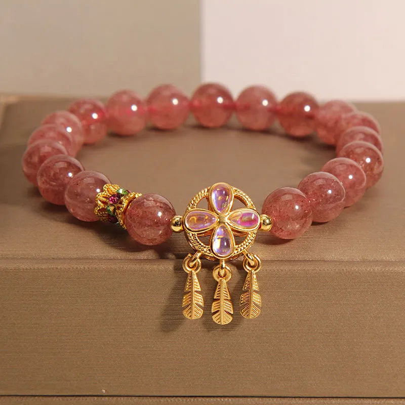 Women's strawberry quartz bracelet with four leaf clover dream catcher crystal pendant
