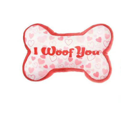 Plush dog chew toy with vocaliser in bone powder, white, pink, or red colours.