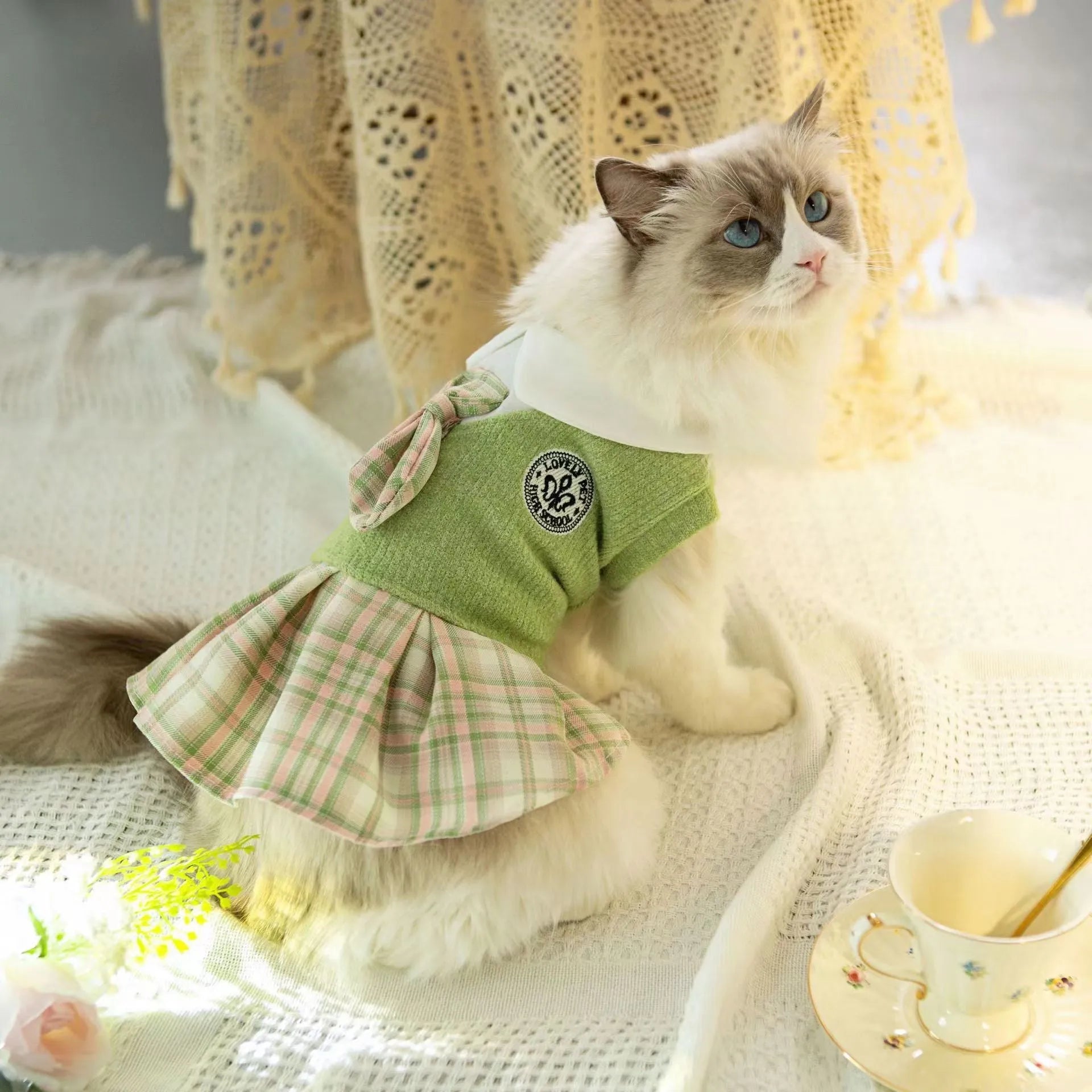 Tartan pattern skirt for a pet dog or cat in princess style, shown in blue colour.