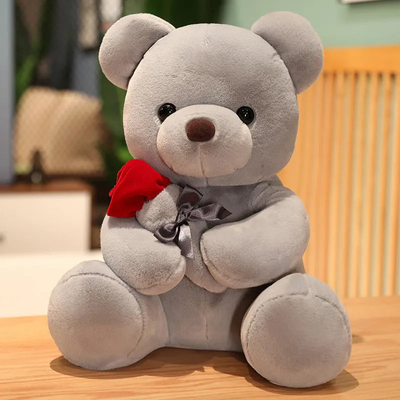 Soft plush Rose Bear teddy bear toy in beige, brown or grey, shown in sizes from 23cm to 45cm.