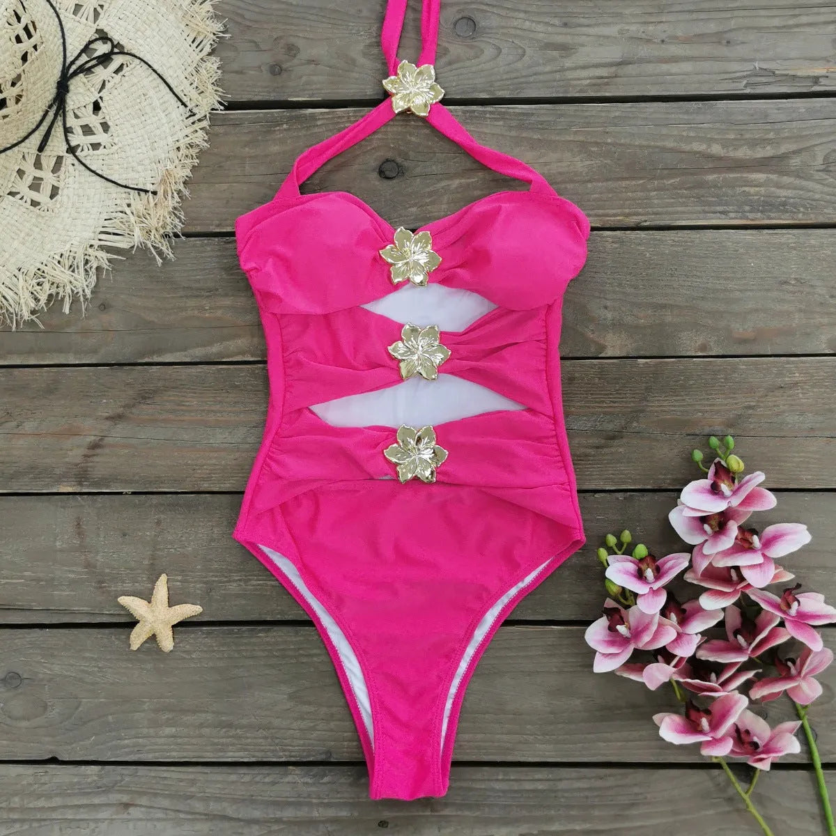 A solid colour one-piece swimsuit for women with a hollow-out tube top and a matching short skirt.