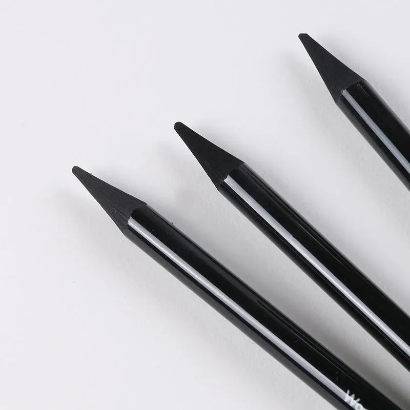 Solid graphite and carbonised drawing pencil set on a suction card pack.