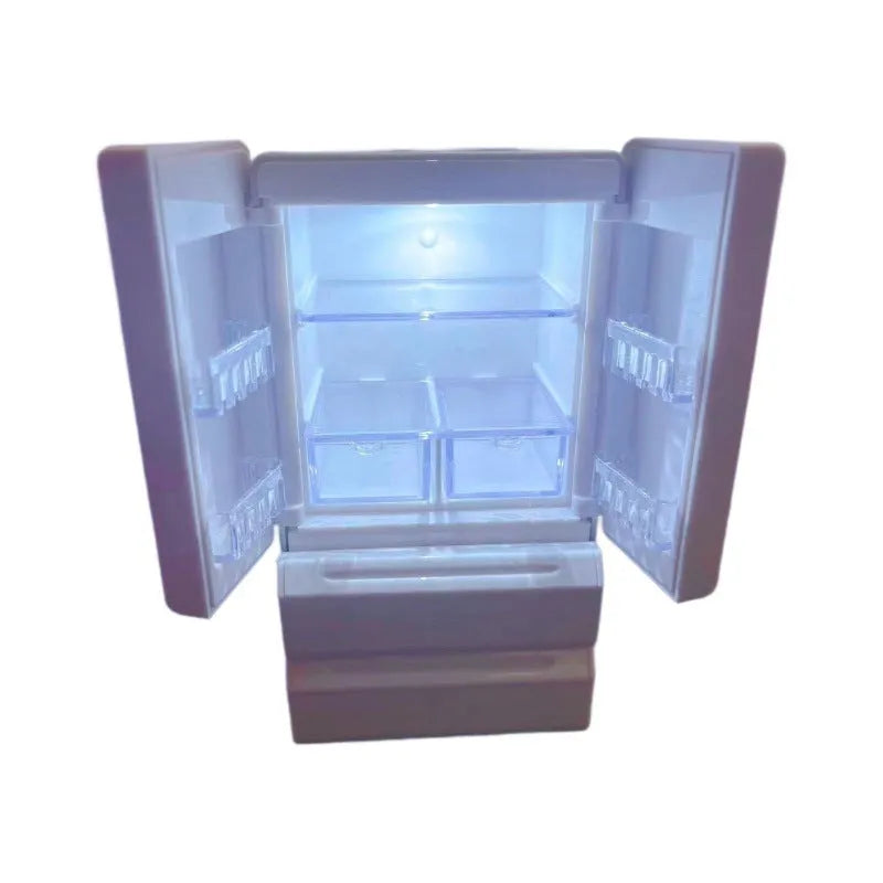 White miniature candy toy plastic model with illuminated feature on display.