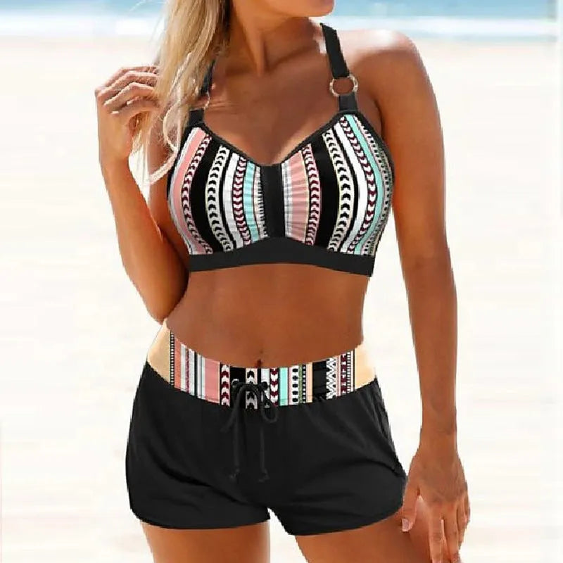 Women's two-piece polyester swimsuit bikini in printed designs available in S, M, L, XL sizes