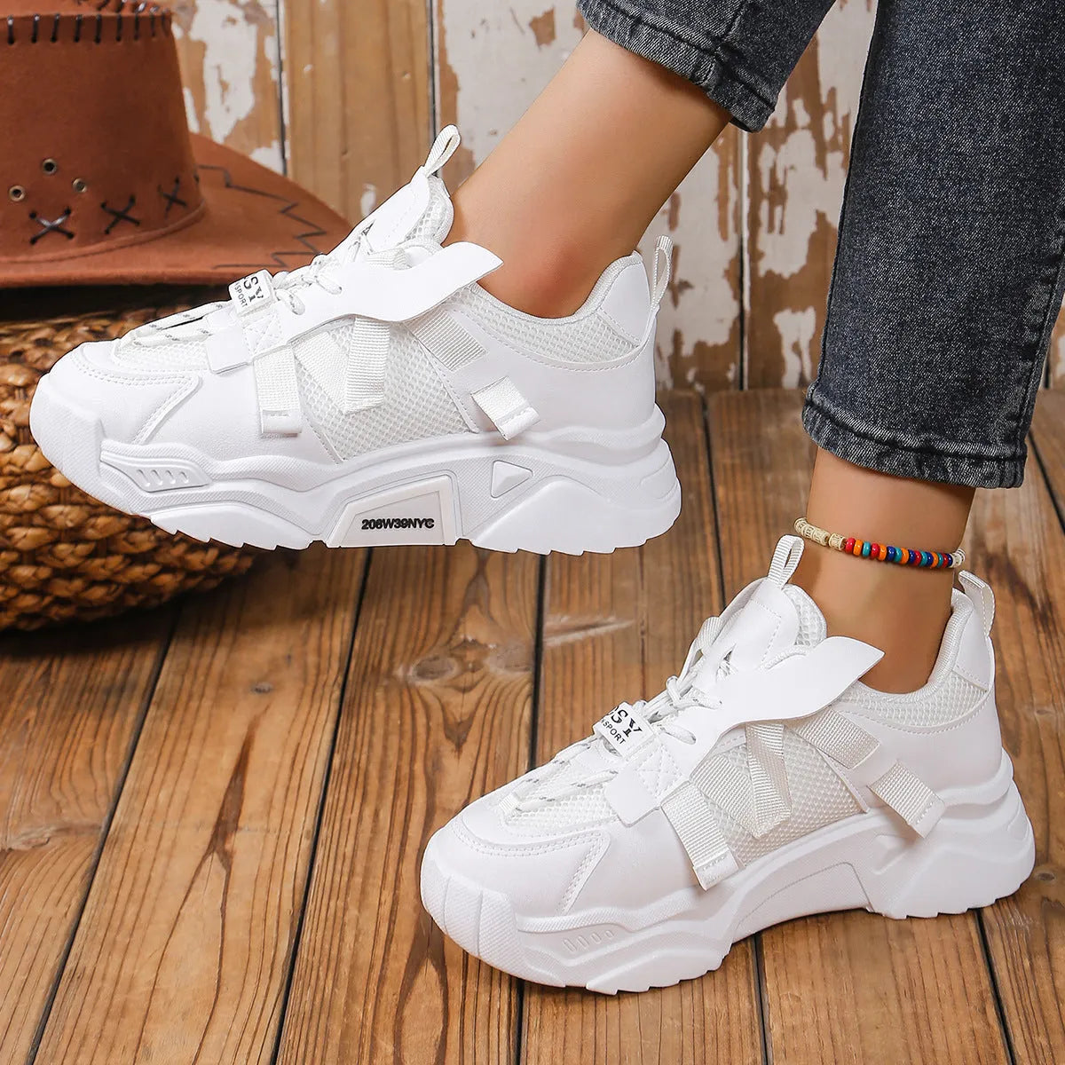 Women's purple platform mesh dad shoes with animal pattern and lace-up front.