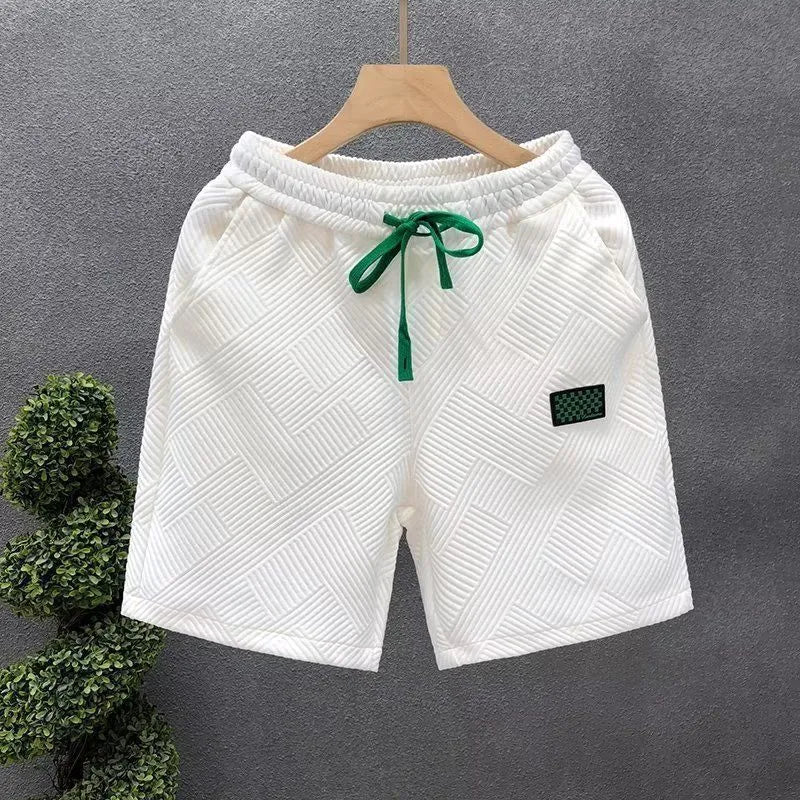 Casual polyester sports shorts in solid colour with micro elasticity, American style design