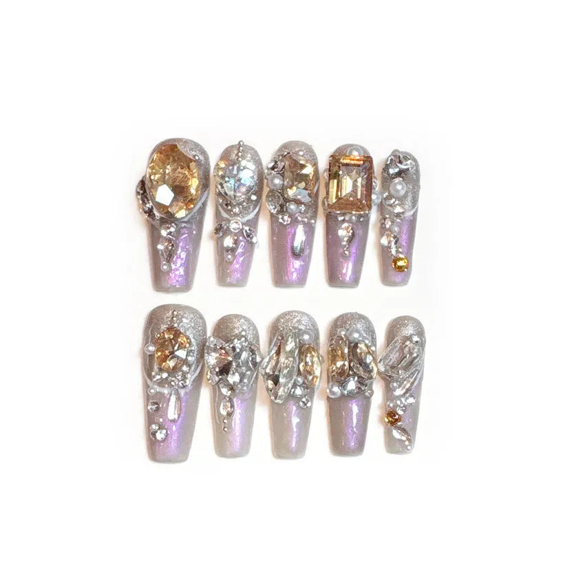 Card of 10 rhinestone-decorated flash style artificial nails for women with jelly adhesive or tool set.