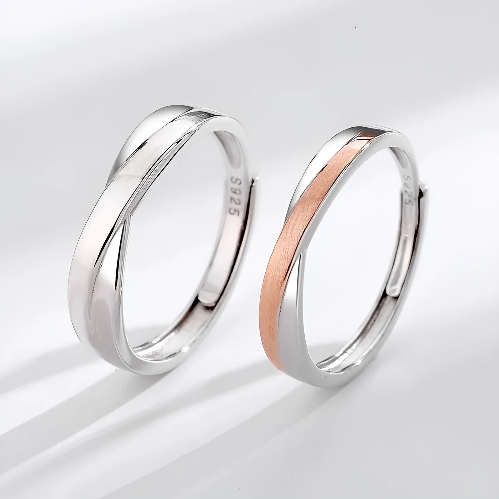 S925 sterling silver Mobius strip interwoven double knot adjustable couple ring on finger showing geometric infinity design