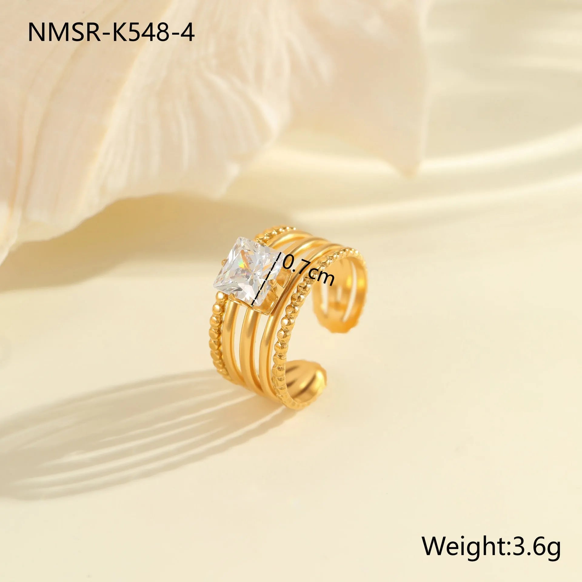 Gold electroplated stainless steel ring with zircon stones and open mouth adjustable design