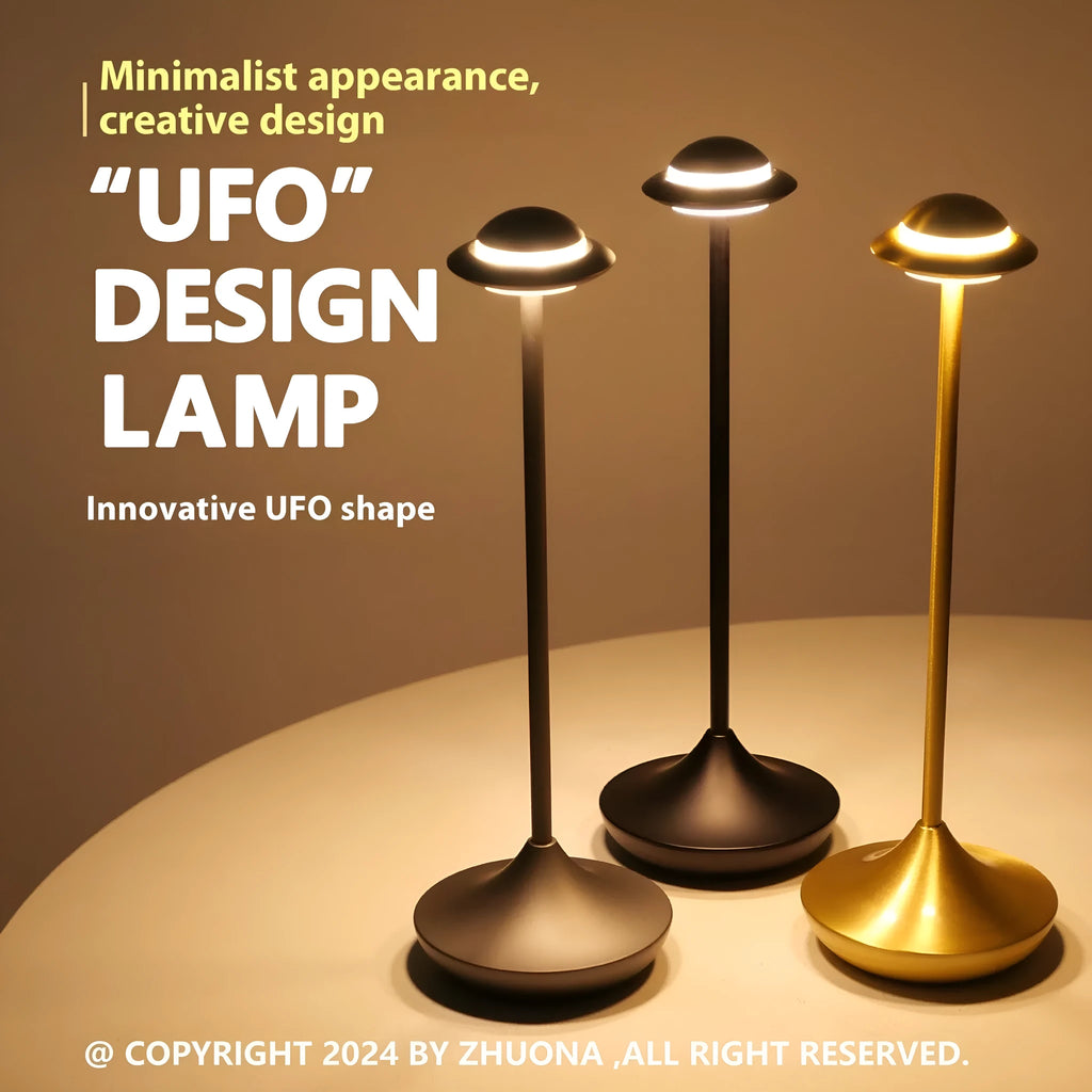 UFO-shaped rechargeable table lamp with touch controls in metallic finish
