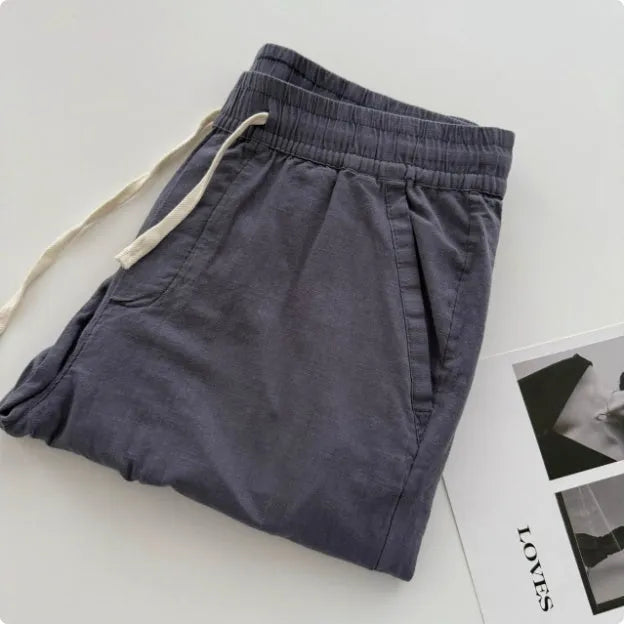 Men's loose straight-leg casual trousers in beige colour with a drawstring waistband