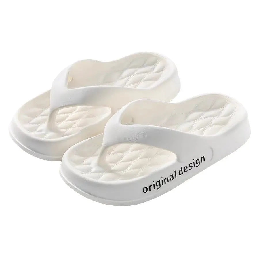 Men's EVA flip flops in multiple colours on a sandy beach background.