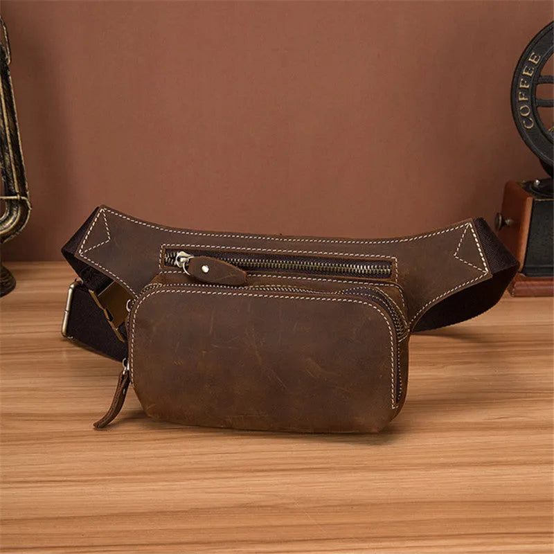 Brown top layer cowhide men's sports waist bag with a pull closure.