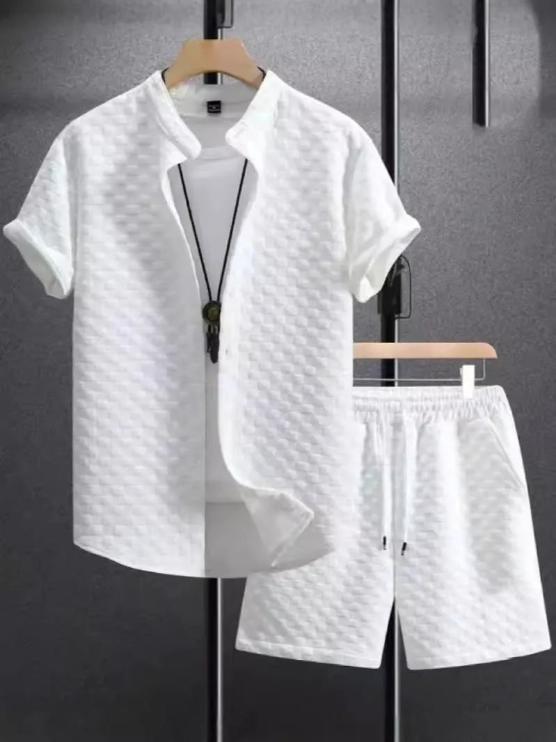 Men's jacquard short sleeve suit set in black with matching shorts, showing front view
